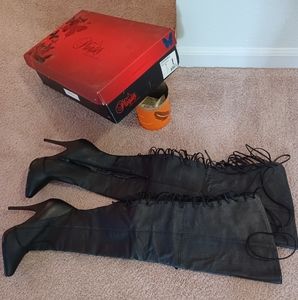 Custom black leather thigh high laced heeled boots